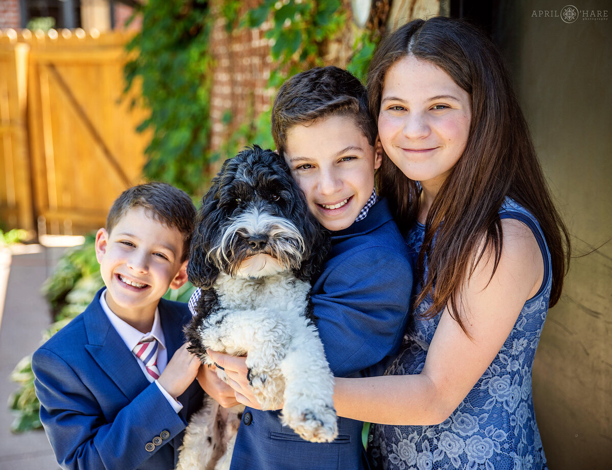 Sweet Family Photo for 3 Young Siblings and their Dog at Home at a Denver B'Nai Mitzvah