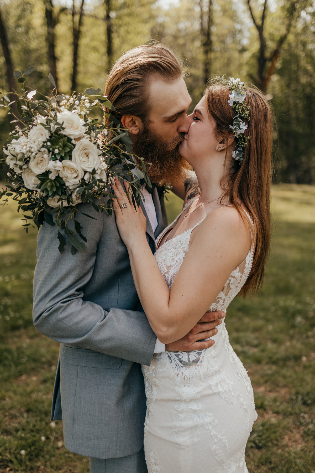 bride and groom kissing