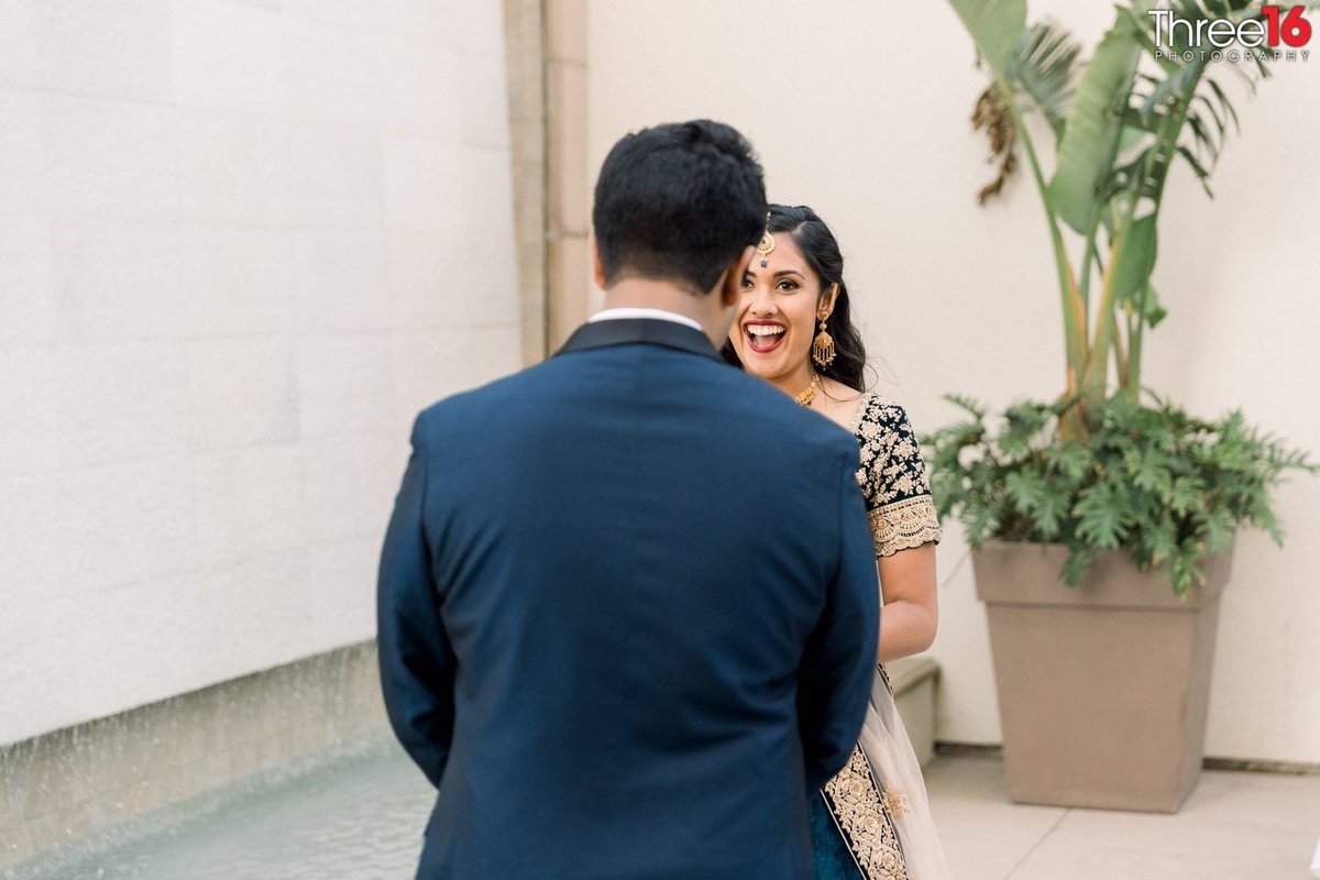 Bride and Groom's First Look is all smiles
