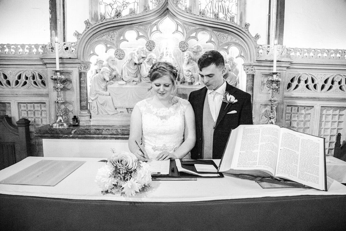 bride signing register