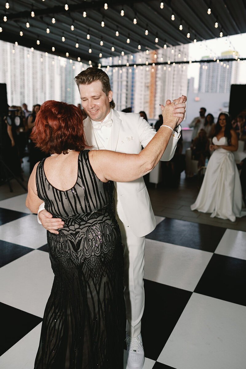 mother son dance at wedding at the penthouse at riverside wharf​
