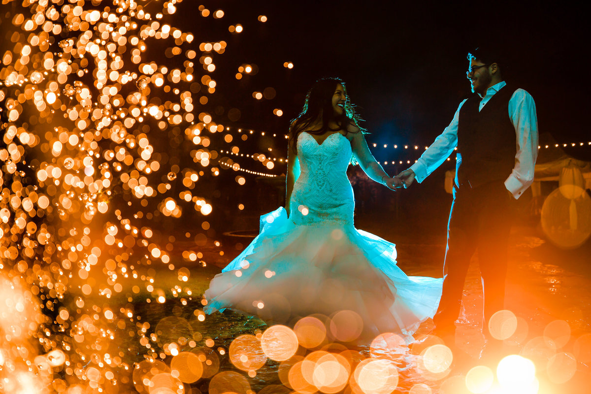 Colorful Bride and Groom Night Time Portrait at The Hummingbird House in Austin