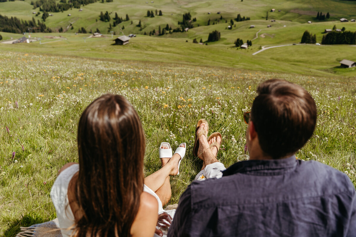 Intimate couple in Scenic Dolomites peaks Alpe di Siusi