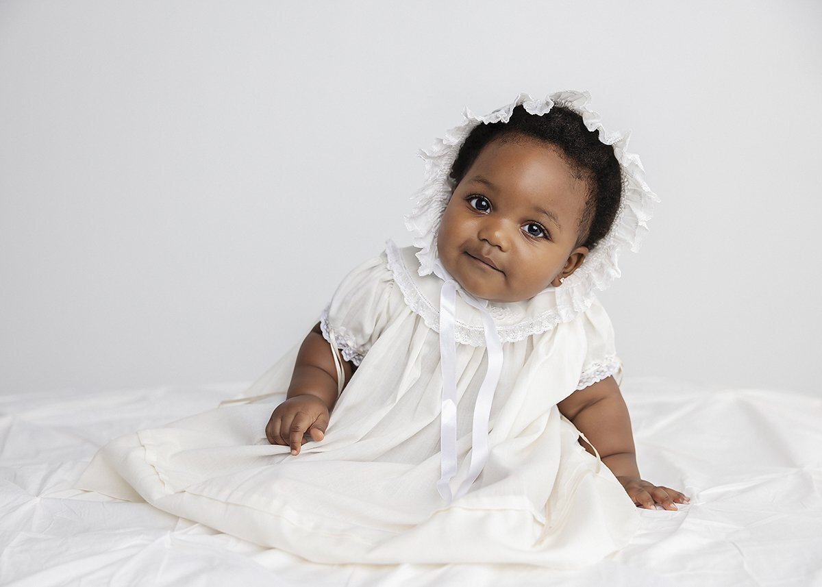 african american baby girl photographed in a vintage feltman brothers outfit