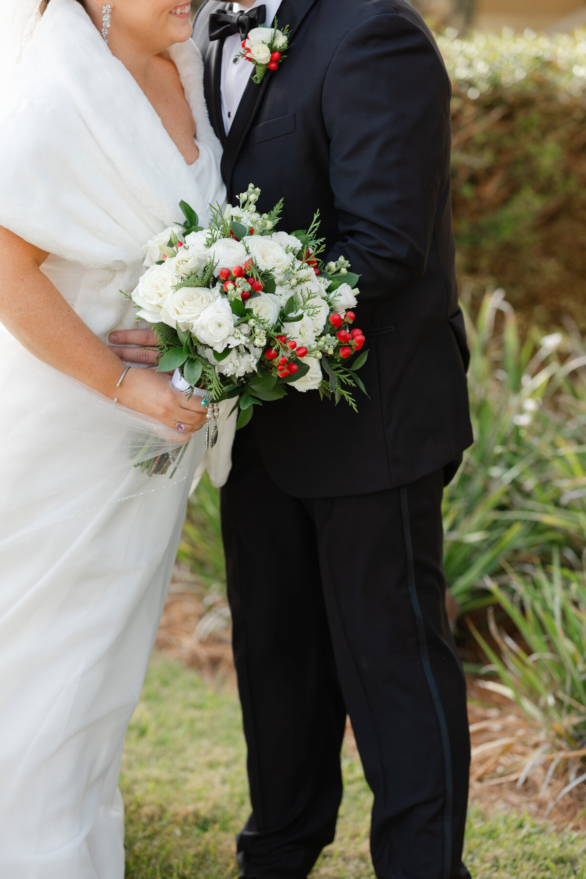 a bouquet with red, white, and green touches