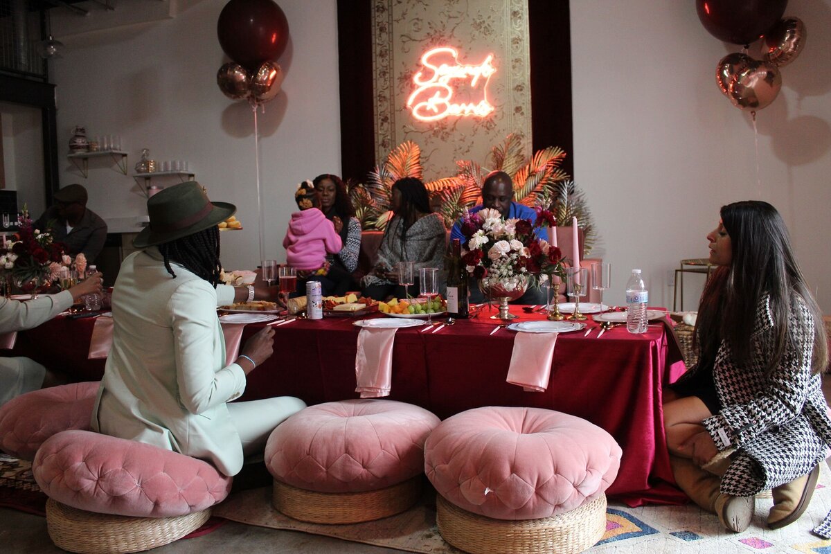 Indoor picnic setup in pink and red