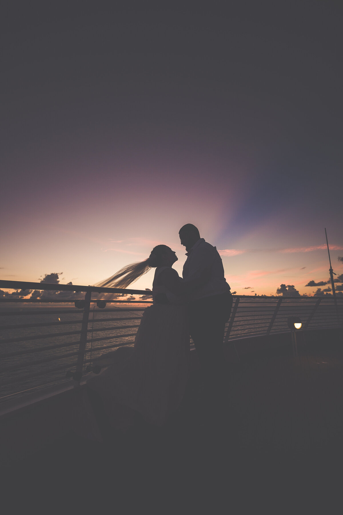 sunset silhouette disney cruise wedding dark and moody wedding photography disney dream