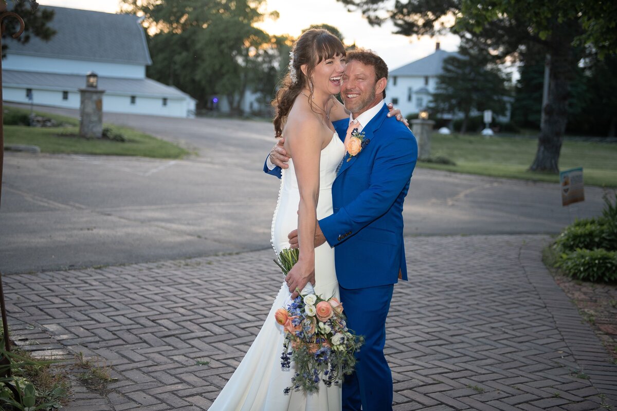 Classic wedding cake cutting moment