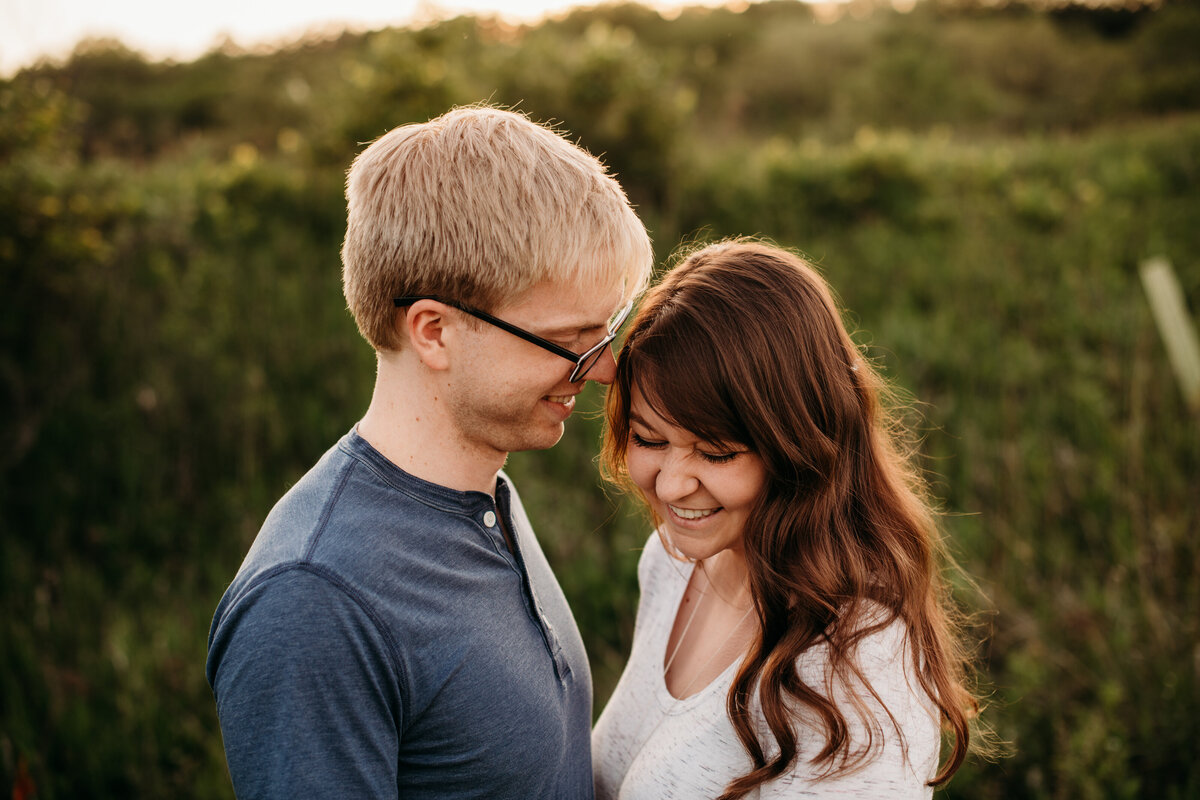 Woman smiling while man smiles at her