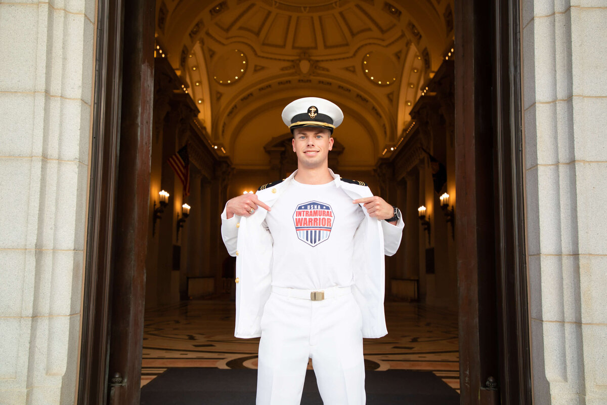 Naval Academy Senior Photo of marine showing athletic logo on chest.
