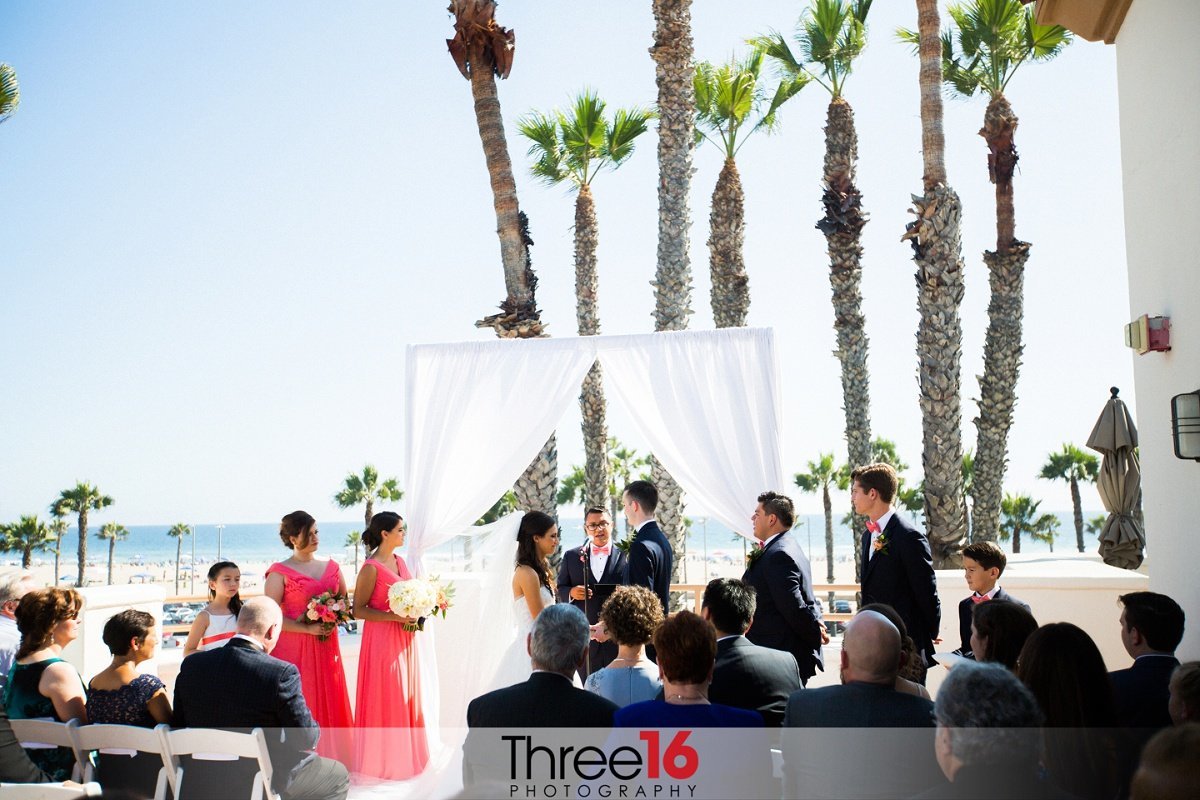 Beach Wedding ceremony at the Hilton Waterfront Beach Resort