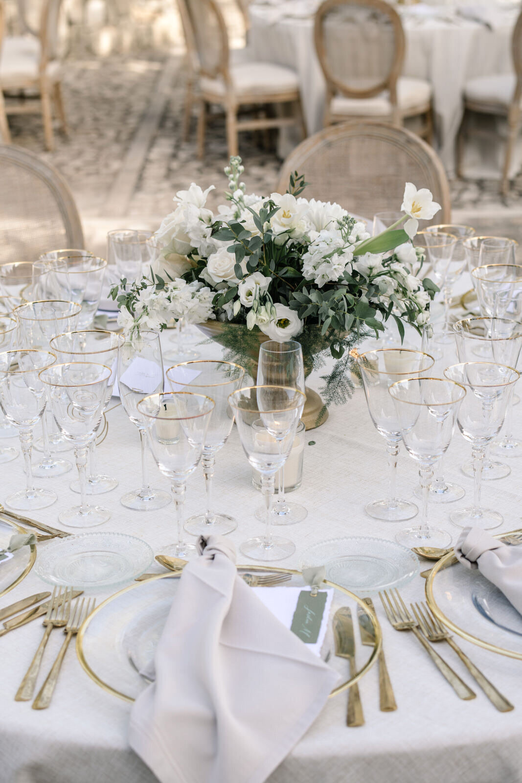 elegant natural wedding table setting in beige gold and olive green