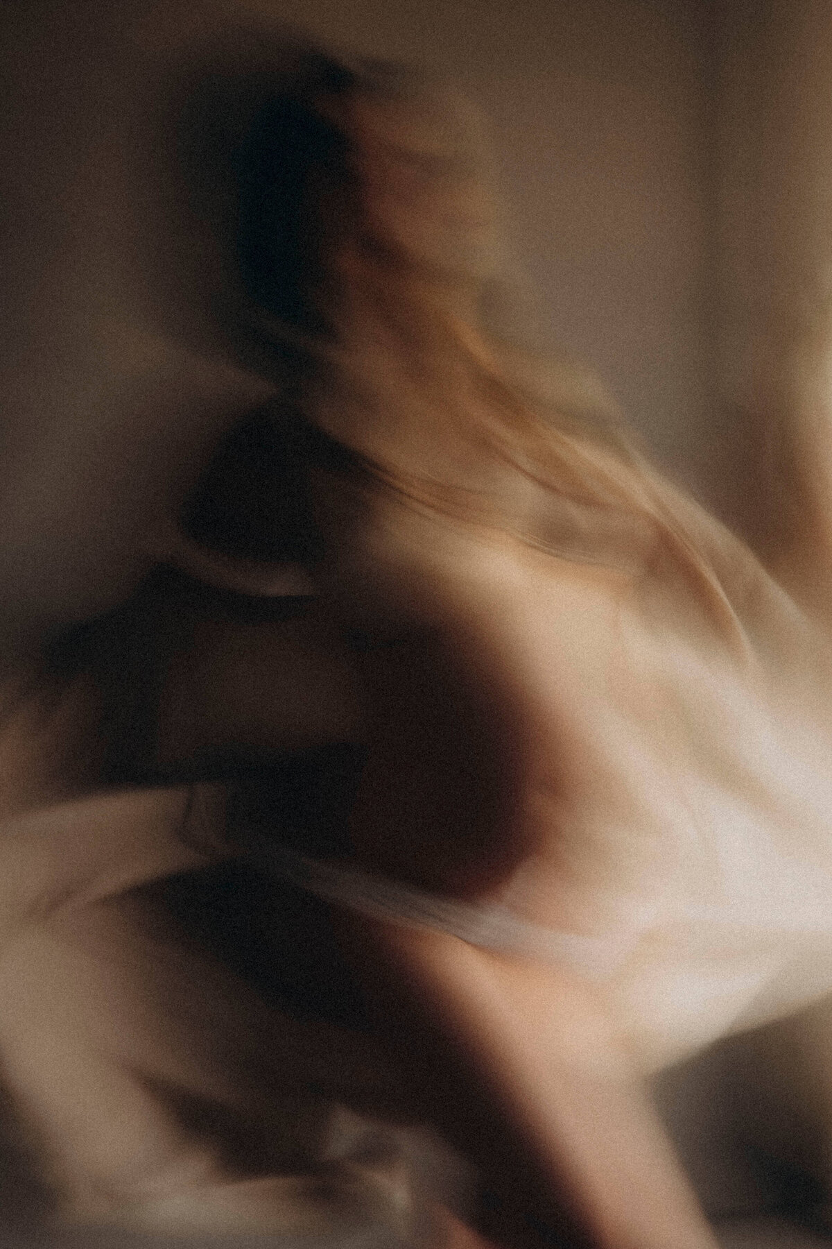 blurry photo of pregnant woman