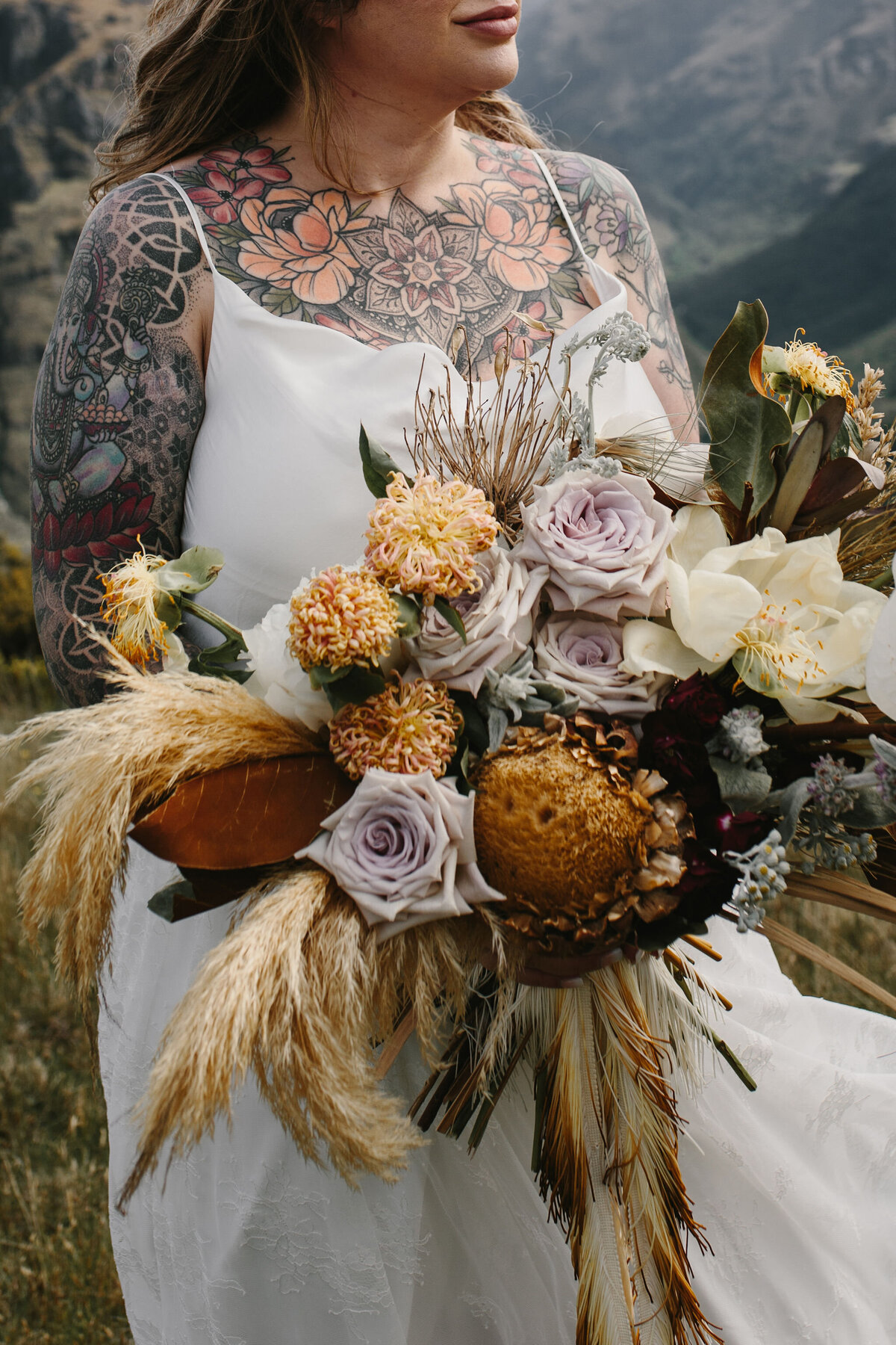 The Vase Floral Co - bridal bouquet designed with long grass and flowers