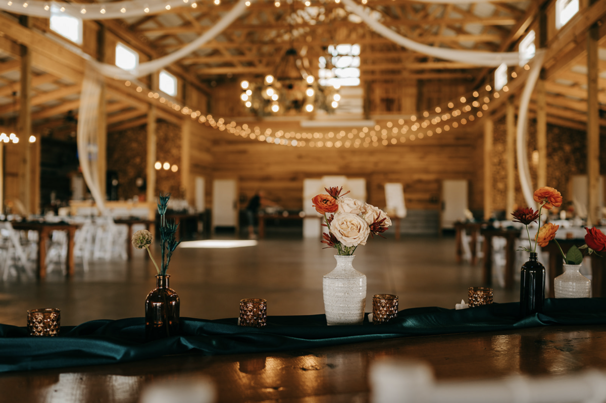 amber and ceramic bud vases in fall wedding