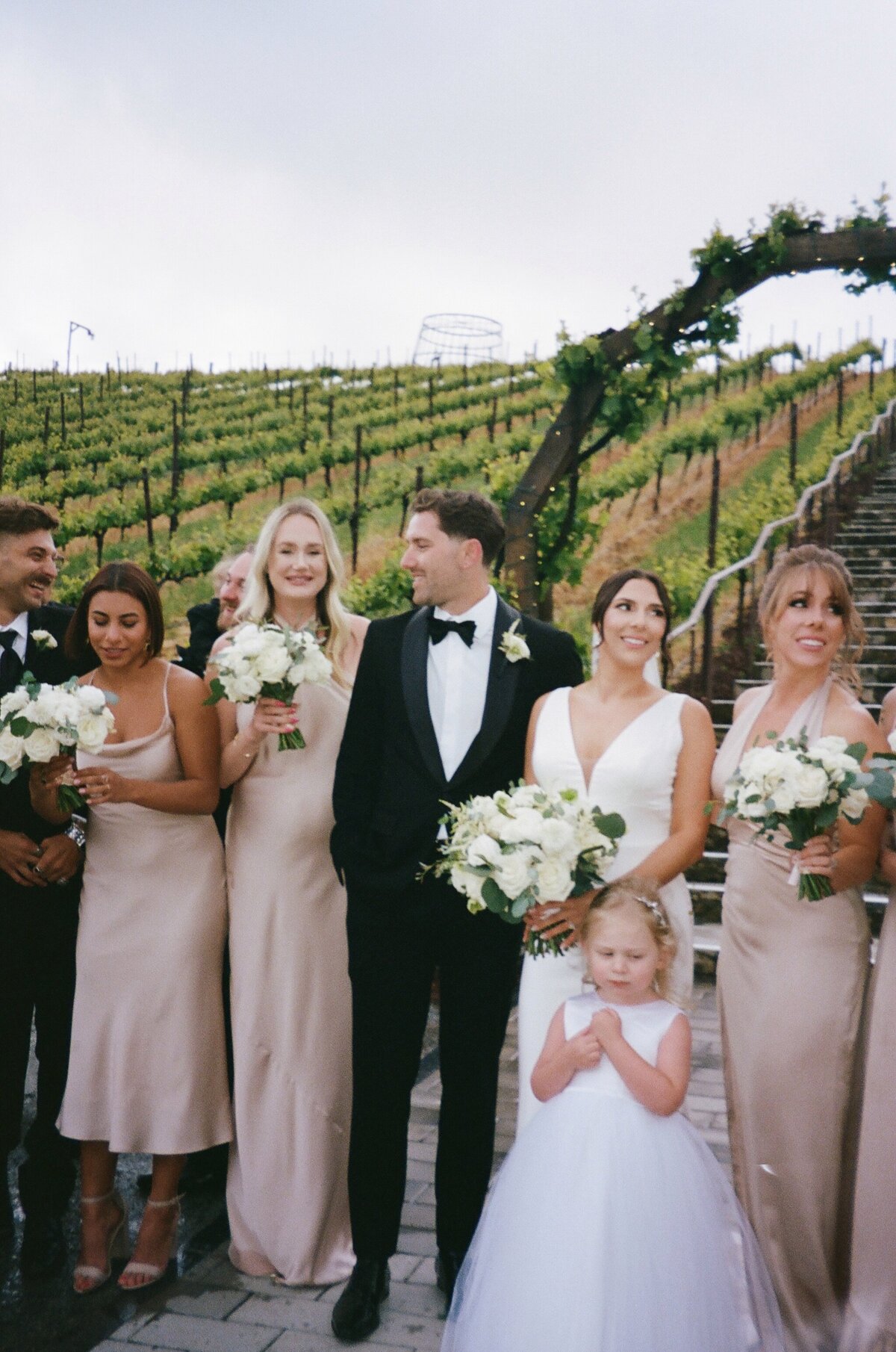 Champagne bridesmaids dresses, white bouquet, bowtie, eucalyptus, vineyard wedding , round bouquet