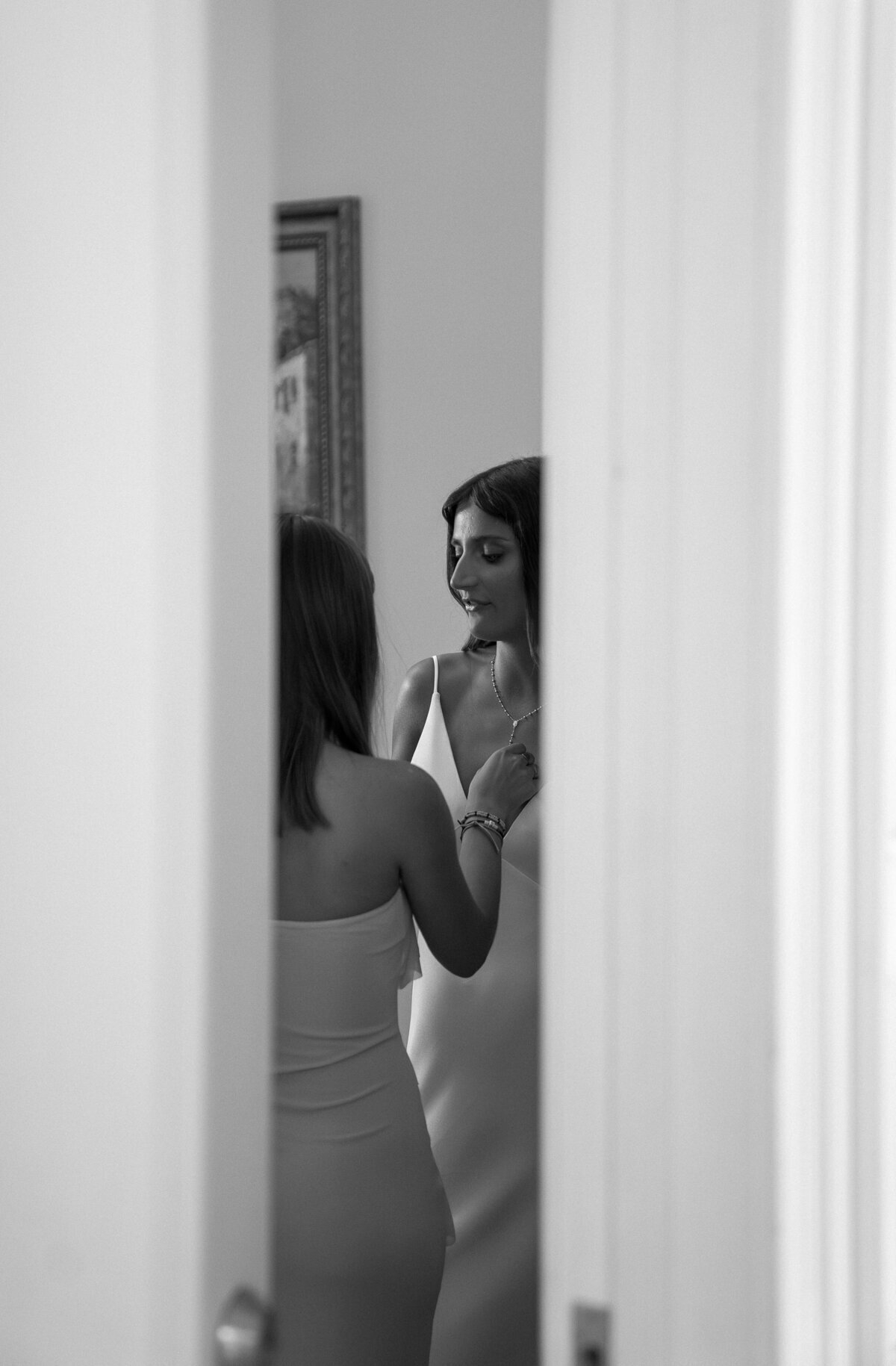 Behind the scenes of bride getting ready on wedding day, taken by film wedding photographer