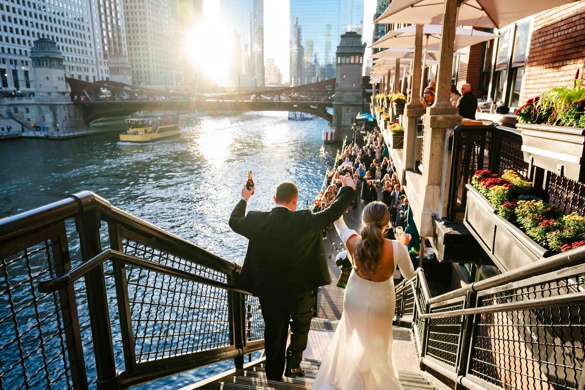 Bride and groom entrance down stairs at River Roast