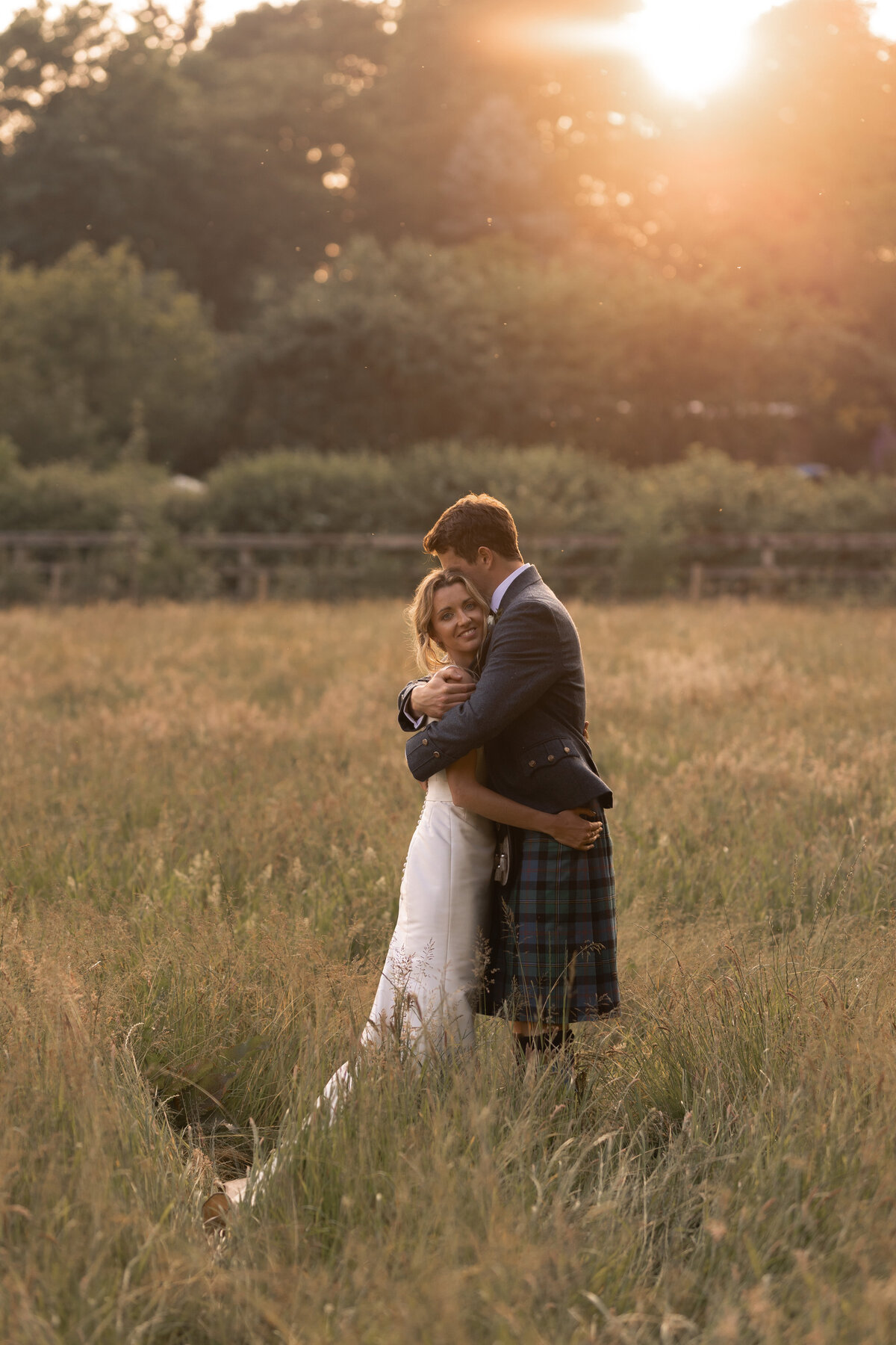 Golden hour editorial wedding photography at Devon marquee wedding