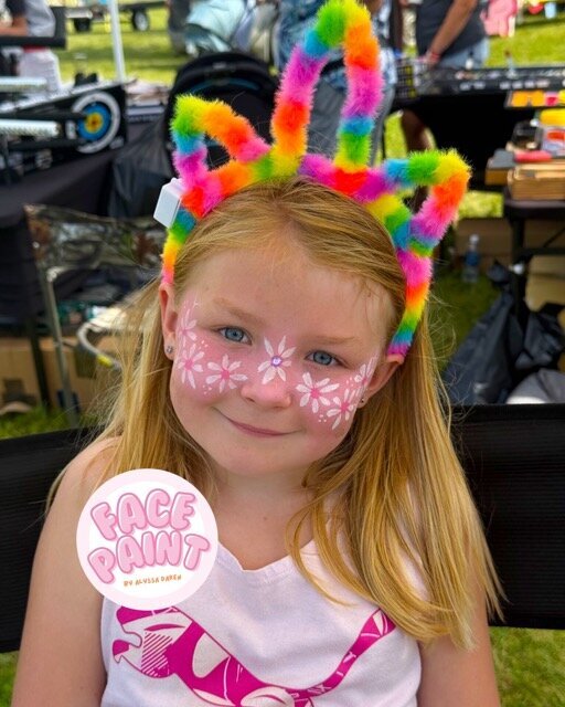 face-painting-by-alyssa-daken-Bemidji-cute-girls-pink-flower-freckles-face-paint-design