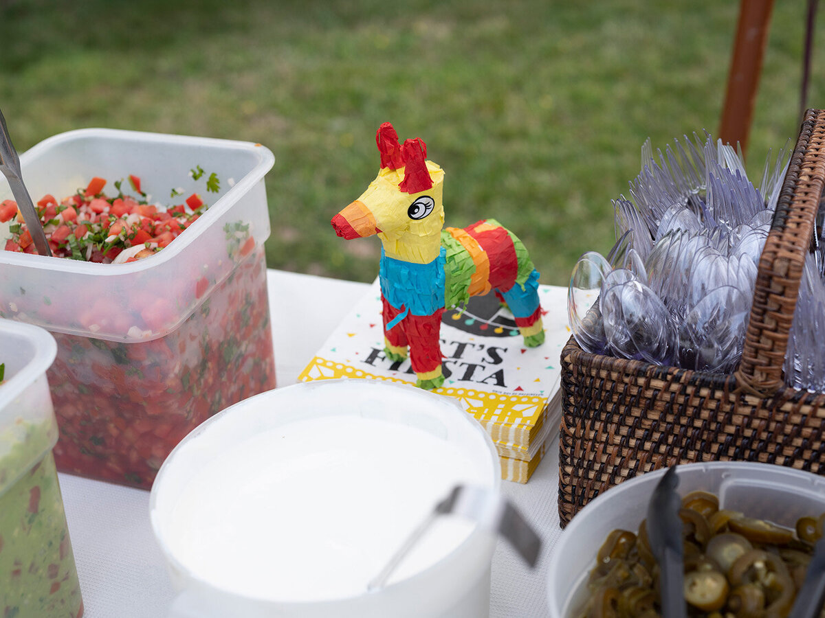 Mini piñata used as festive table decoration at a My First Fiesta first birthday party in Novato, captured by a San Francisco Bay Area first birthday photographer.