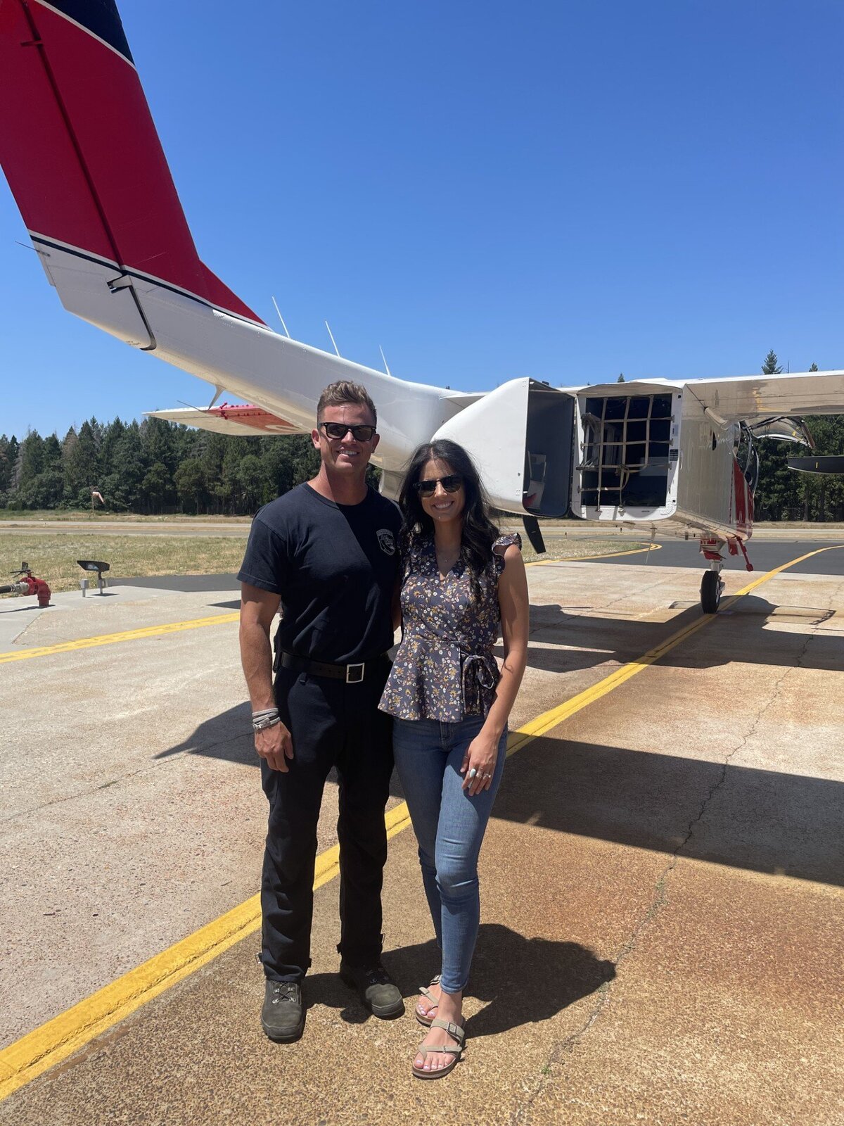 Dr. Thalia Nicholson with her firefighter spouse, highlighting her connection to first responder culture