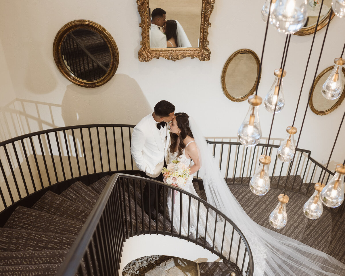 bride and groom portrait on the stairs at the perona farms the reserve