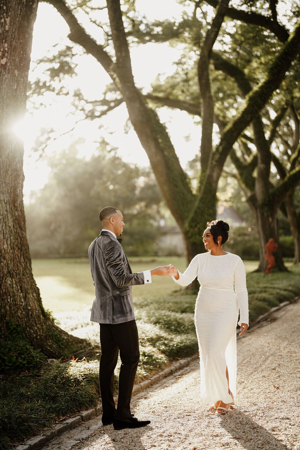 engaged-couple-in-the-gardens-at-golden-hour