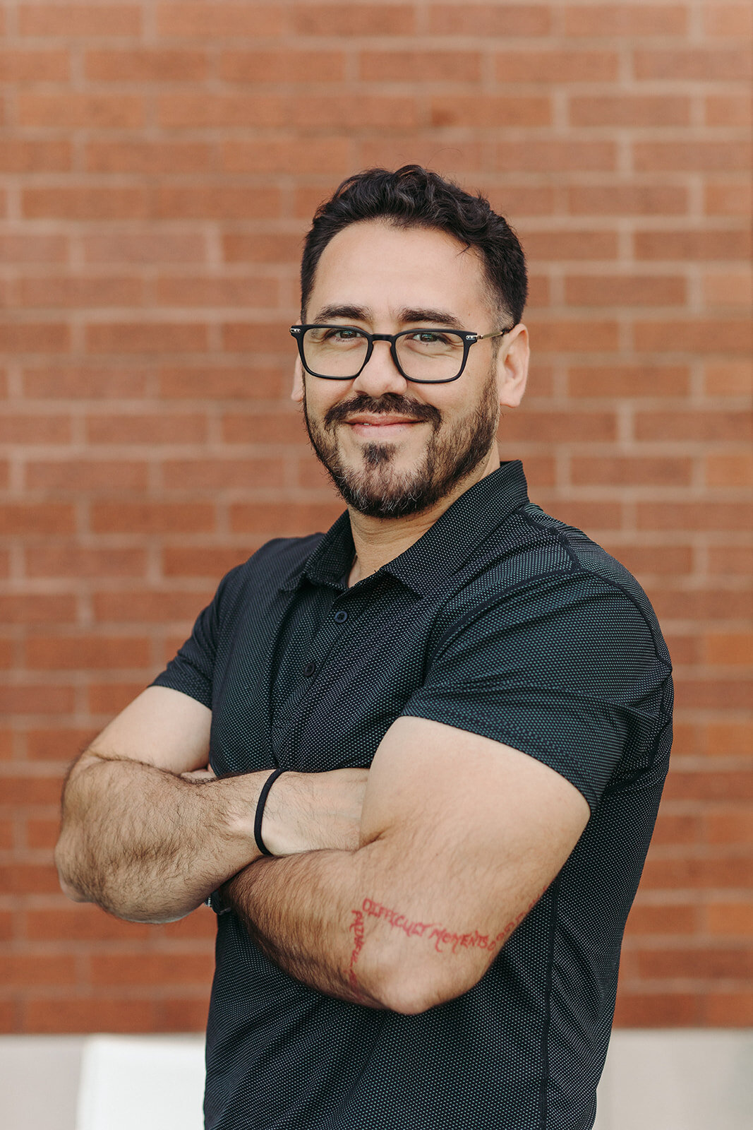 Utah Family Photographer captures man in glasses smiling during brand photoshoot