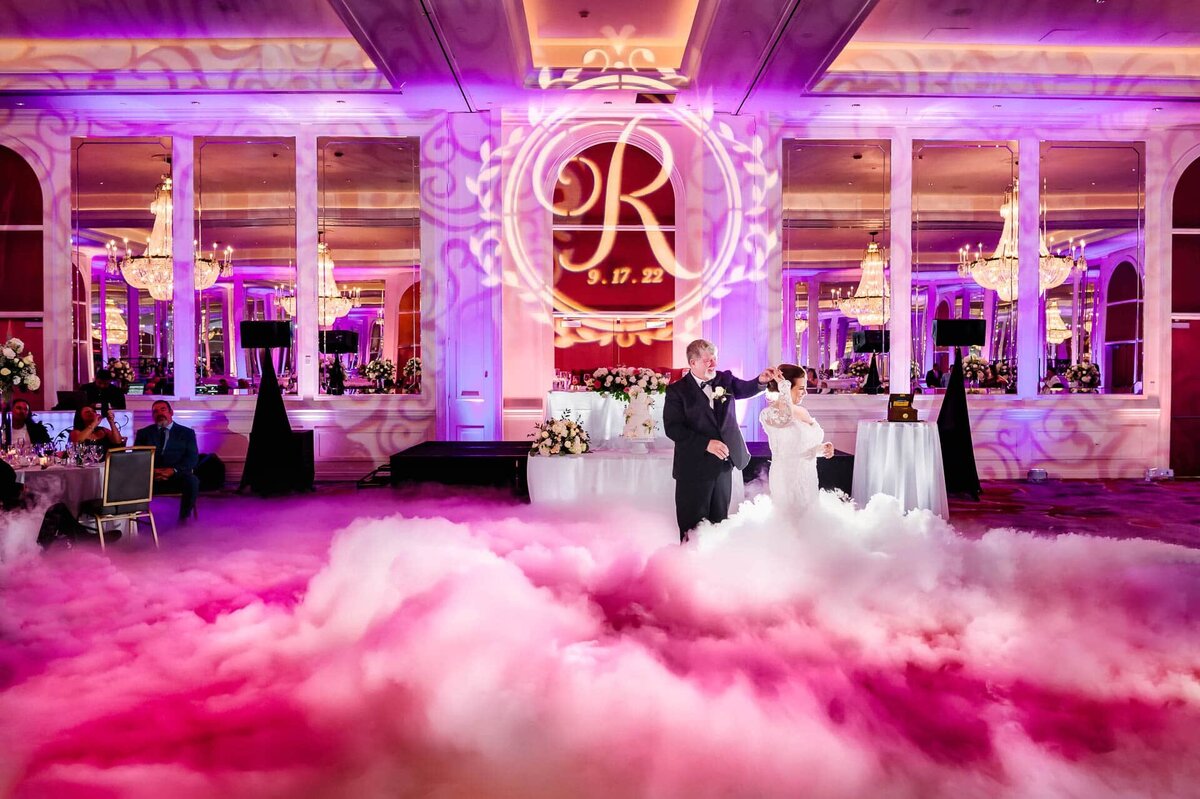 bride and groom in ballroom at paso del norte hotel  In el paso texas