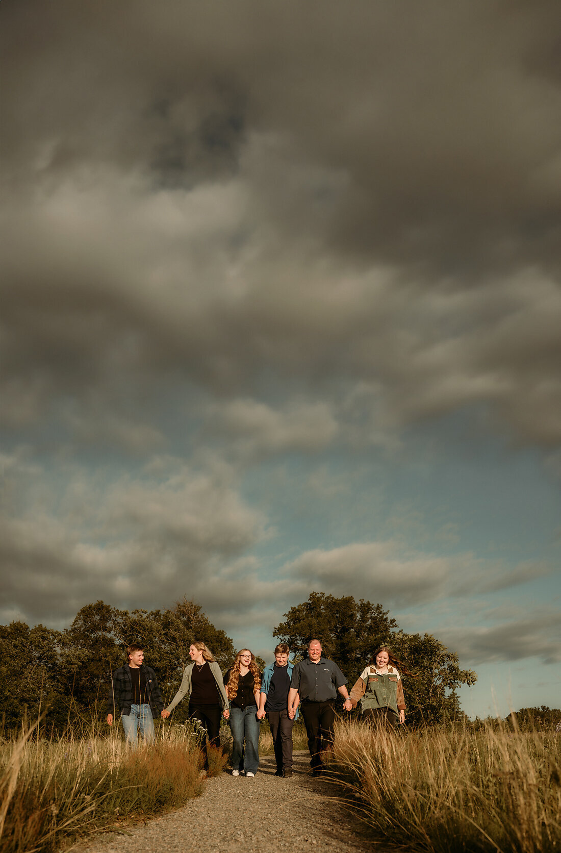 Capture timeless family memories with our heartwarming photo sessions in the Twin Cities, MN. Experience natural, candid moments that showcase your family's unique bond and love. Book your session today for beautiful, professional photographs that will be cherished for generations.