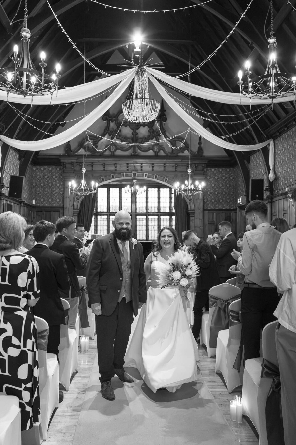 Wedding reception decor with chandeliers and draped fabric – Worsley Court - Manchester