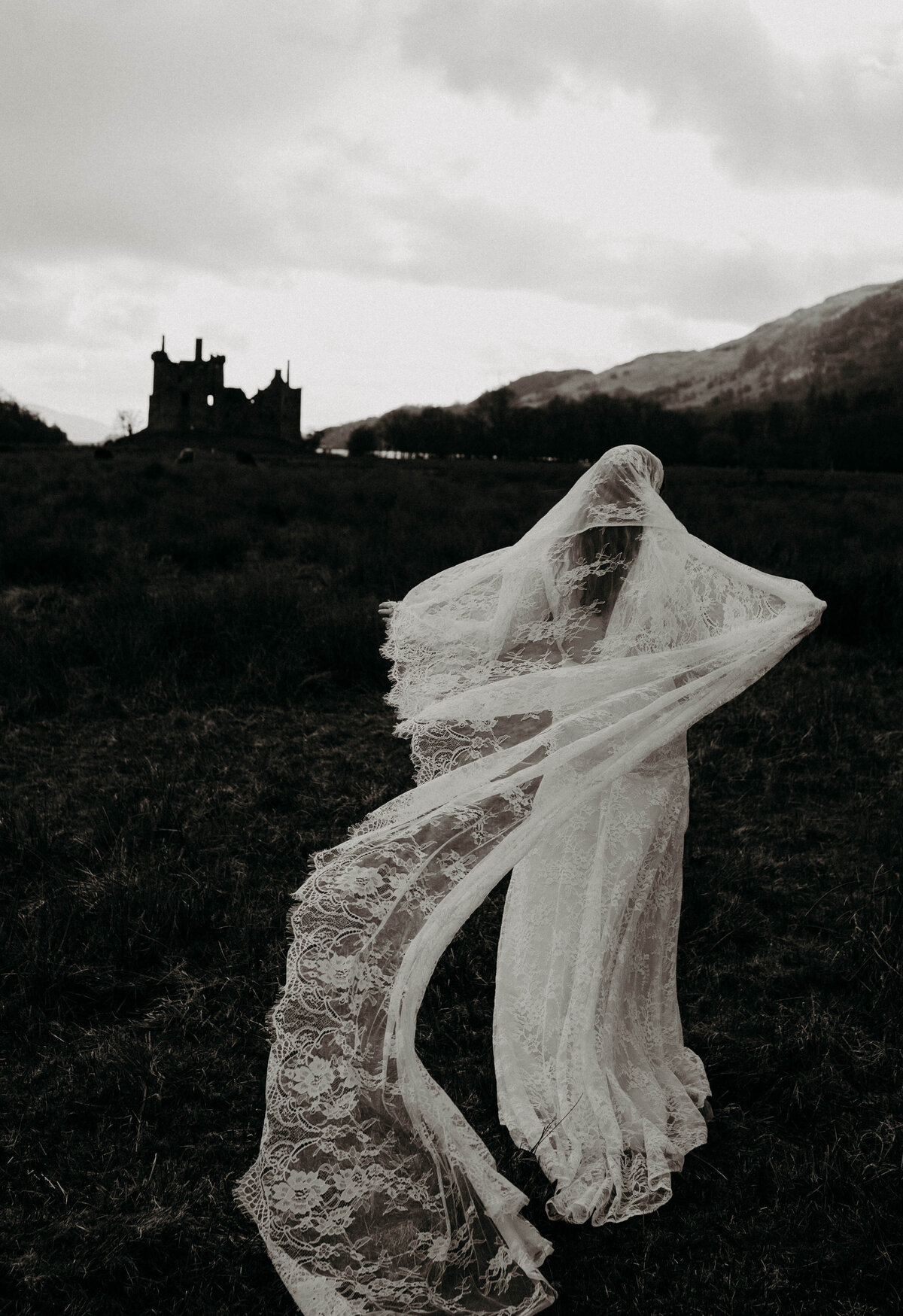 dramatic moody ethereal scotland castle bridal portrait