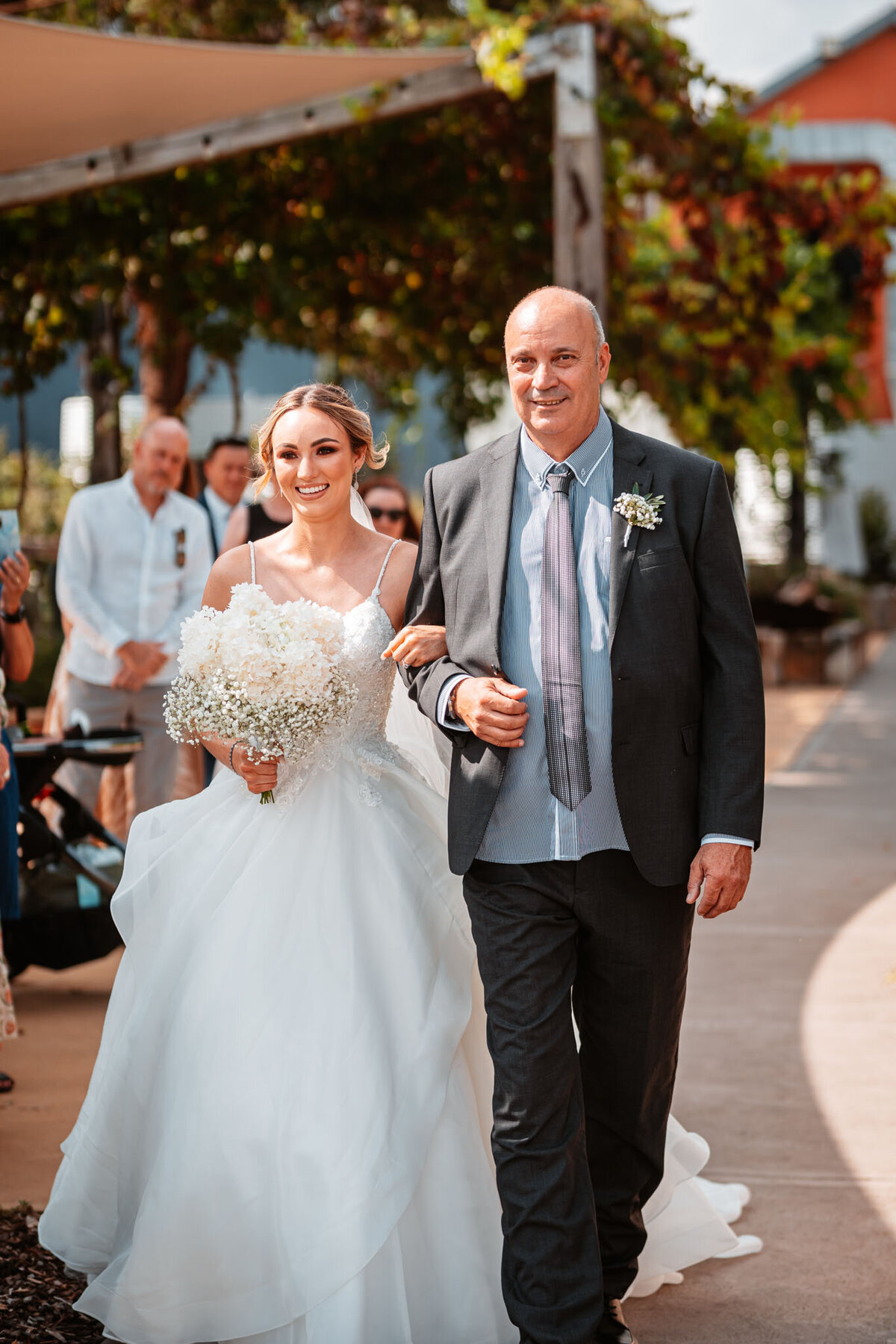 Emily and her Dad had walked with her down the aisle