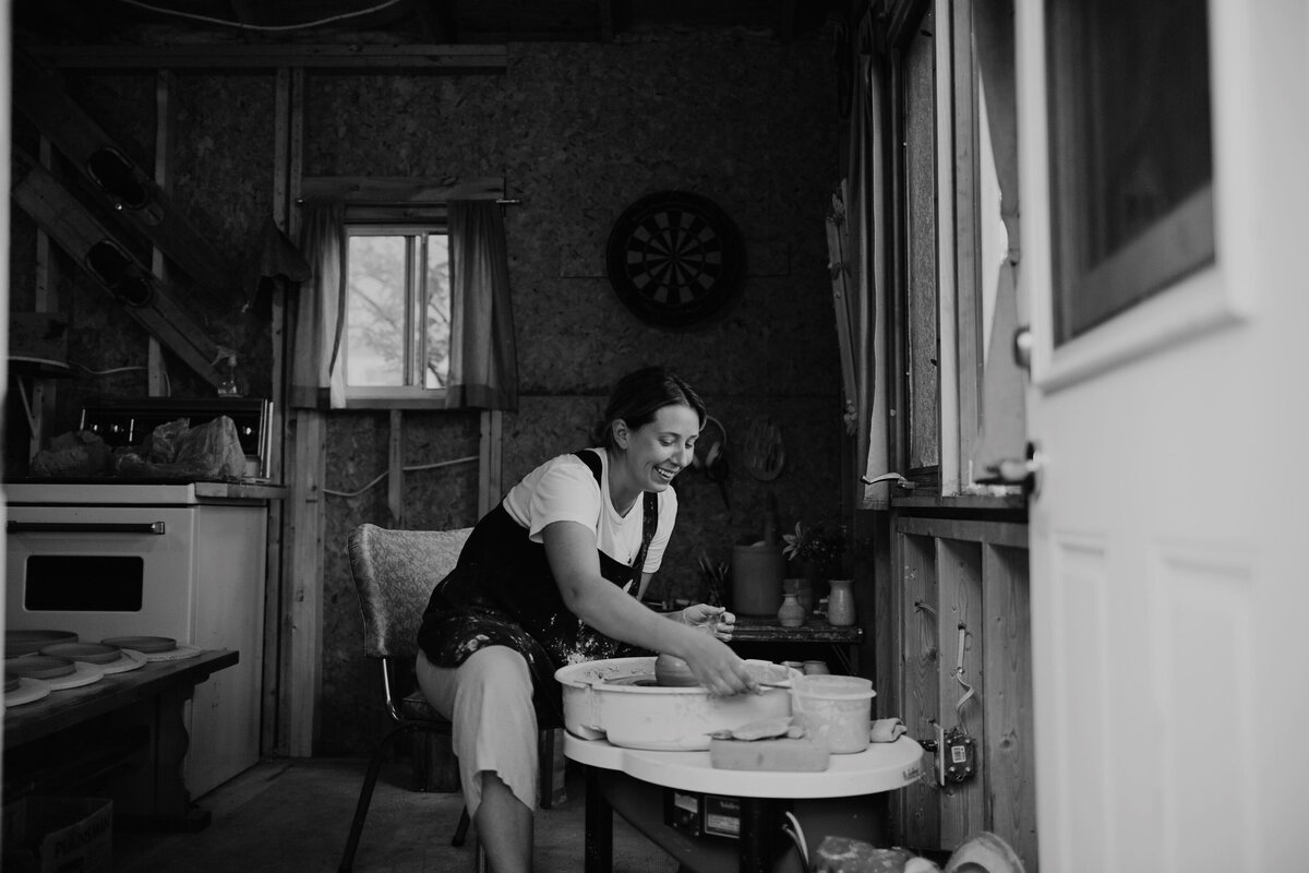 Sarah Henry, potter works in bunkhouse studio in Fort Qu'Appelle