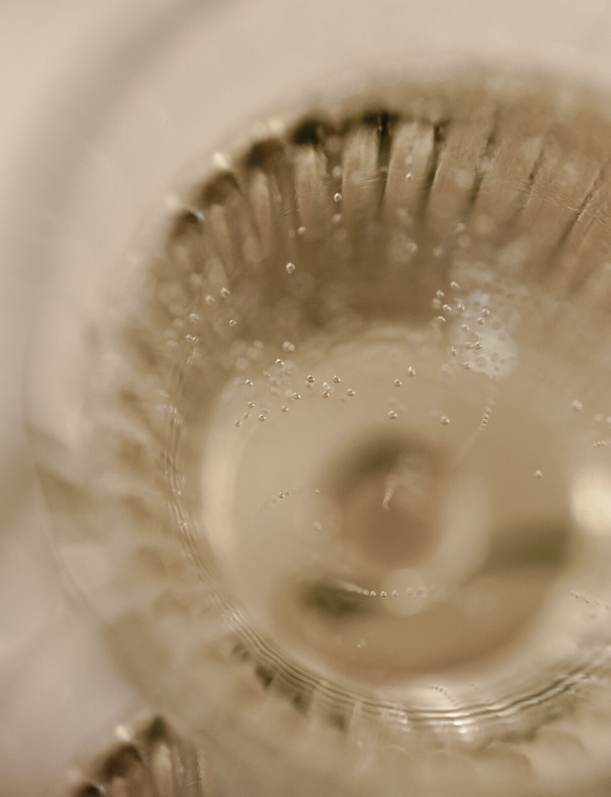 close detail wedding photo of champagne bubbles at The Colony Club, Detroit