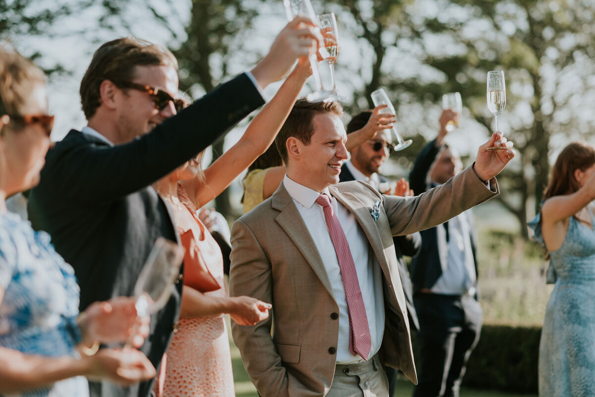 Guests toasting during outdoor speeches
