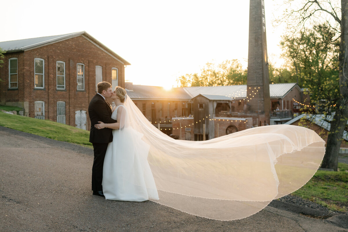 Bride and groom embracing at sunset at a hudson valley wedding venue planned by KR Occasions