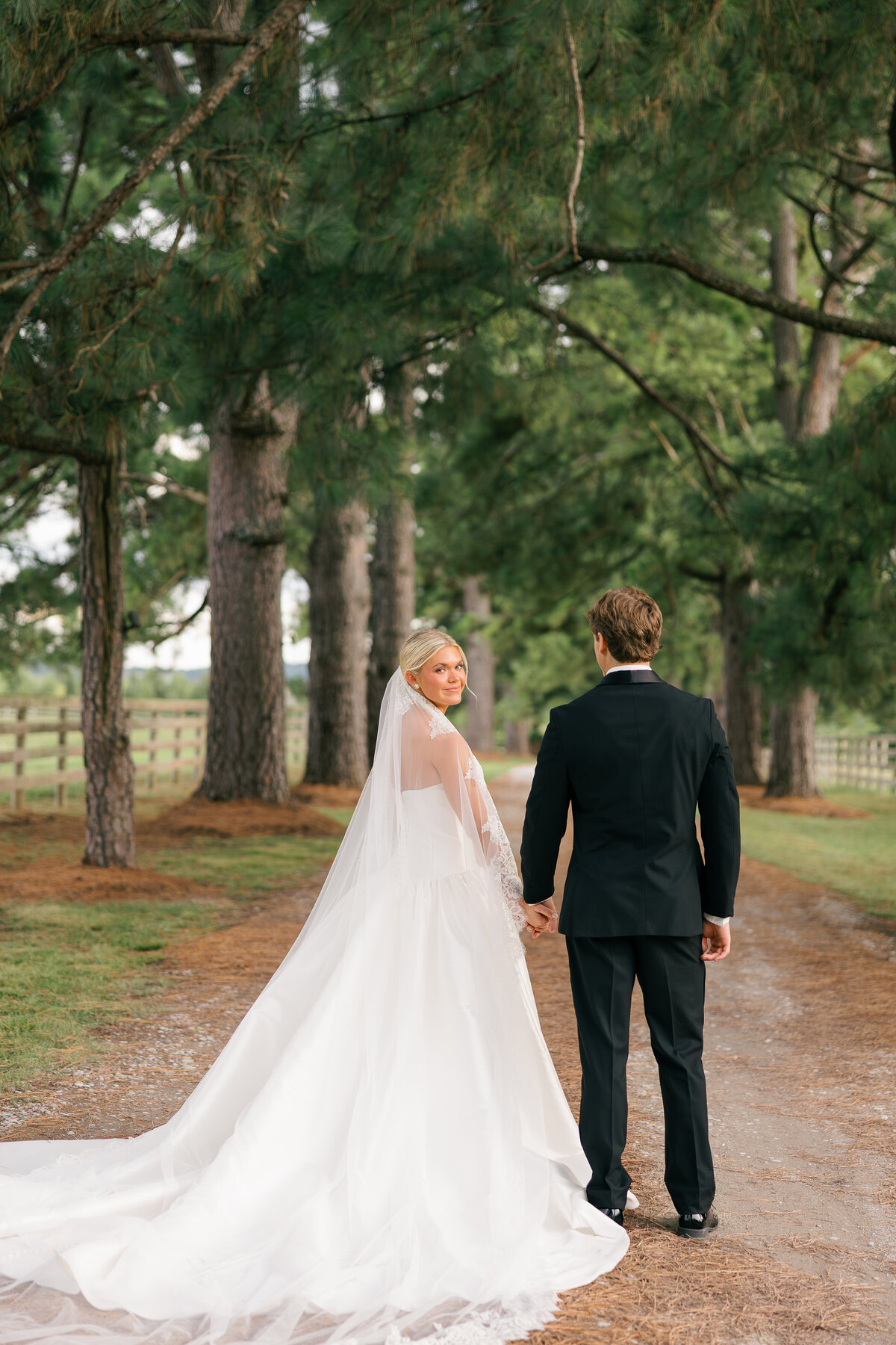 Bride and Groom Walking Under Trees – Arkansas Farm Wedding Photography