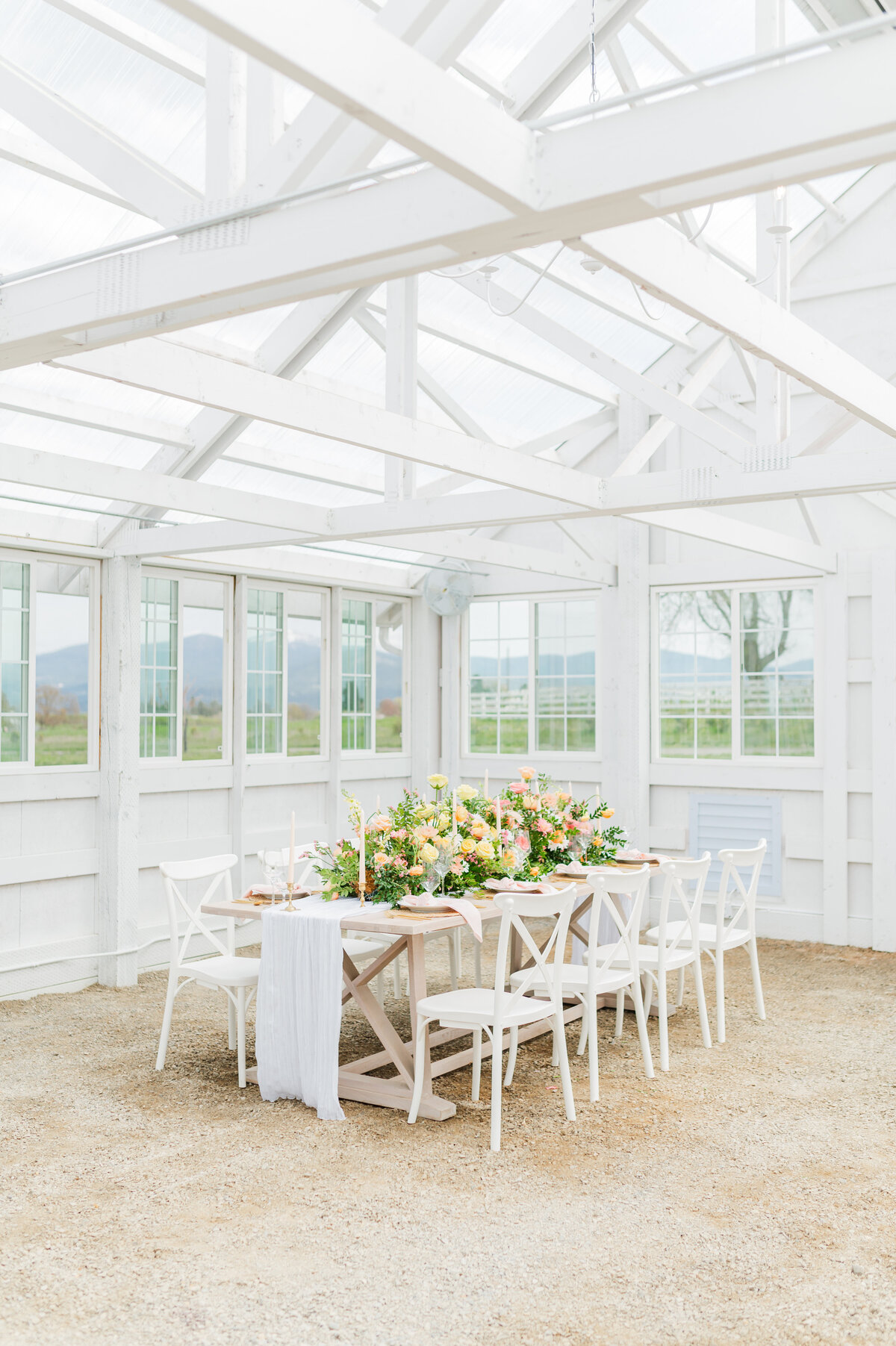 wedding reception table scape in greenhouse wedding venue
