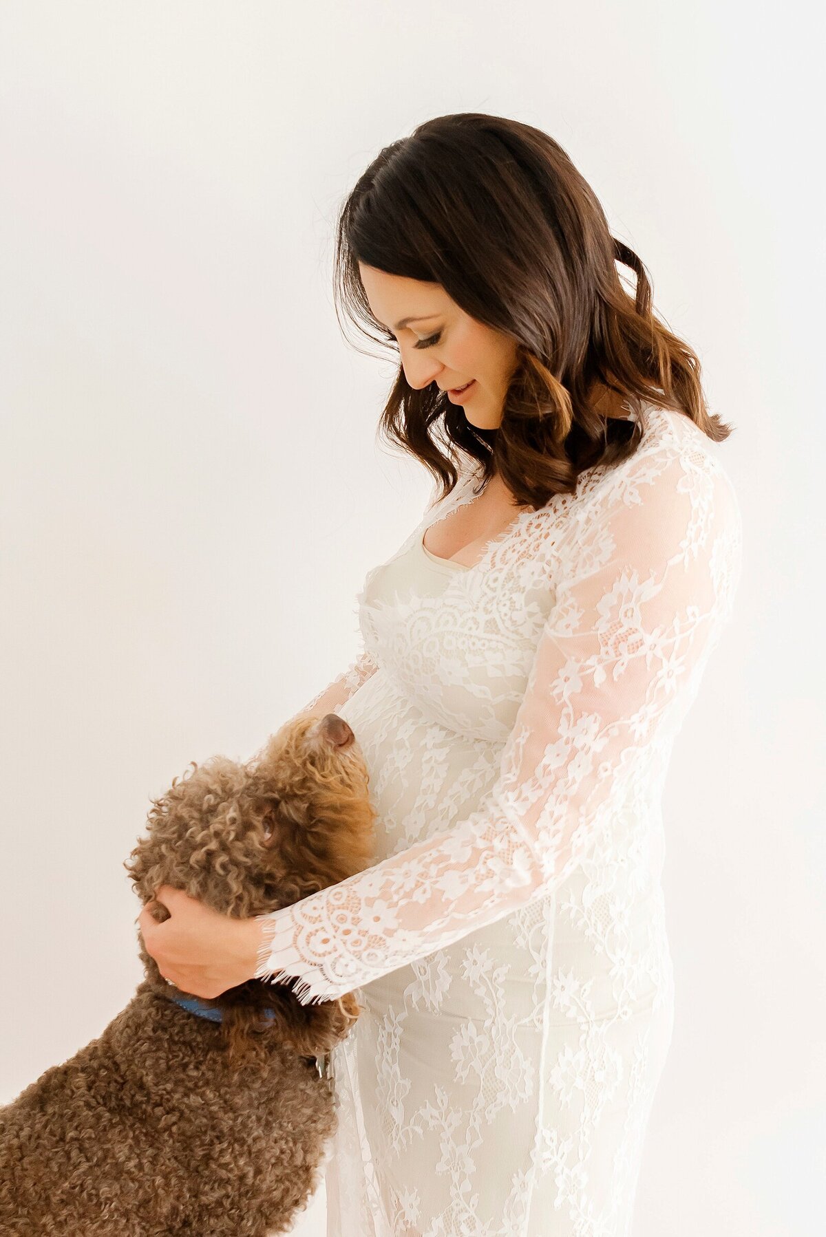 newborn baby with sibling by maternity photographer boston ma​