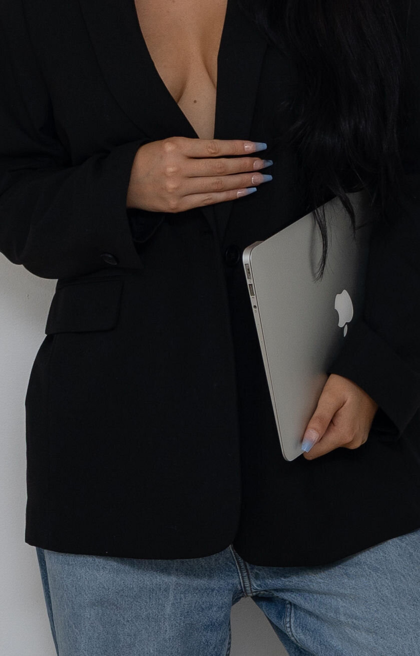 Business women holding laptop 