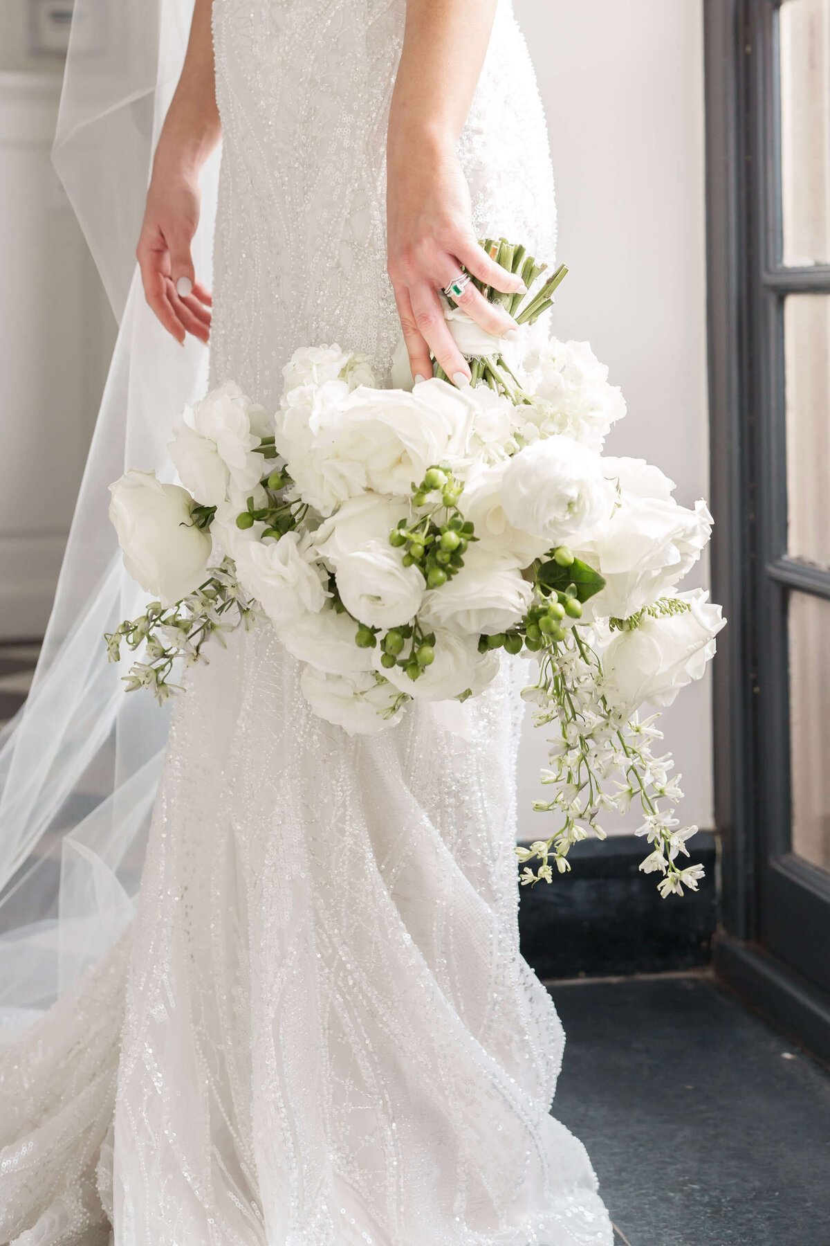 wedding dress with white bouquet