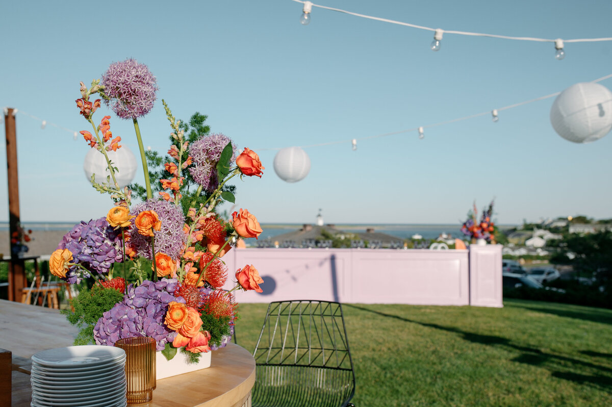 Rice paper lanterns, fruitwood post al fresco,  purple flex bar, purple pedestals