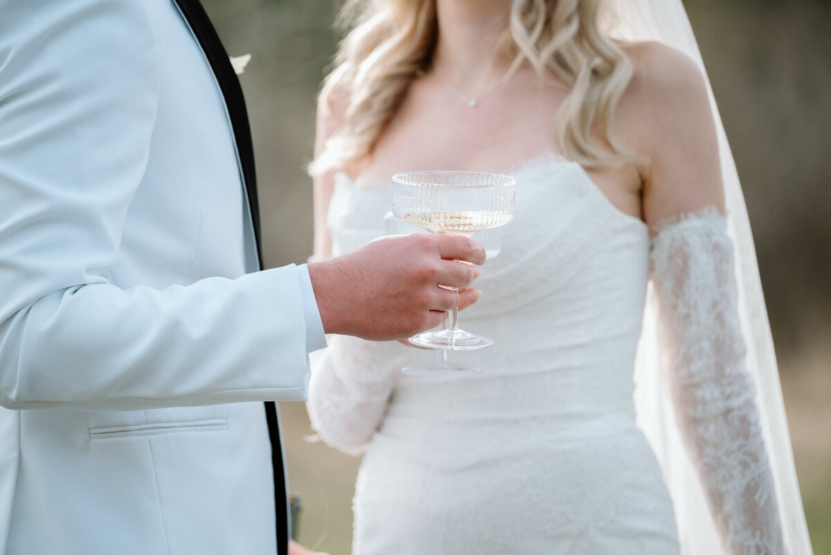 wedding in Banff National park. Documentary styled photo with bride sitting on floor
