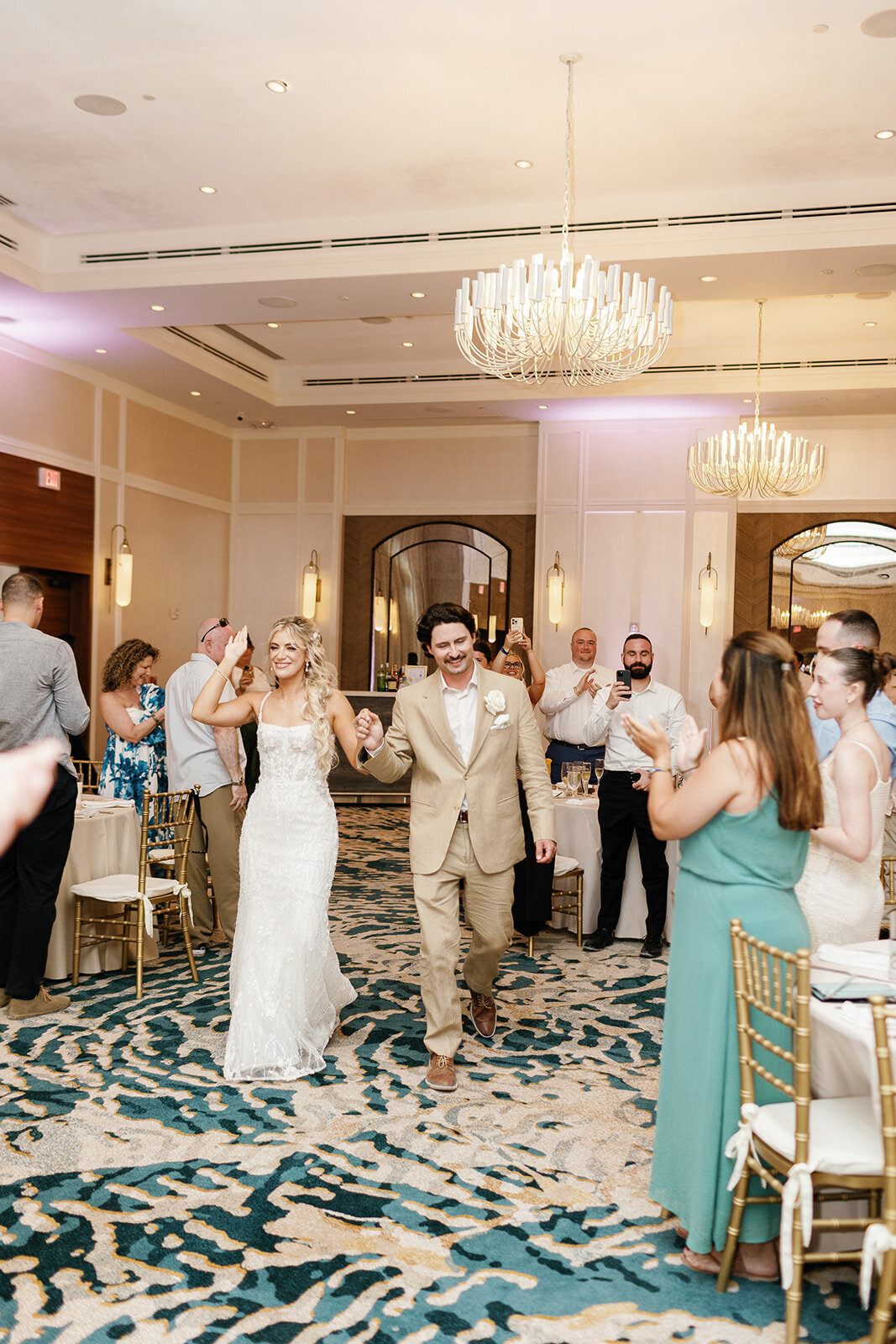 Brenda & Stephen making a joyful entrance to their Cheeca Lodge wedding reception.