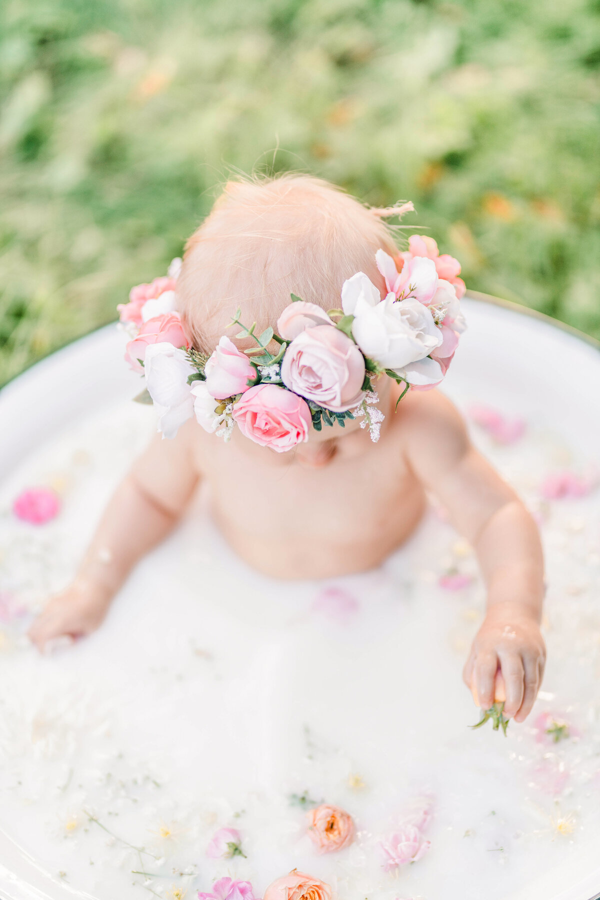Mjölkbadsfotografering med blommor gnosjö