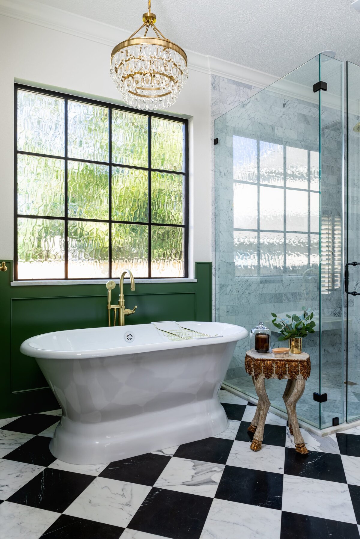 kyleen bushroe interiors coverdell bathroom tub with black and white tile and large shower