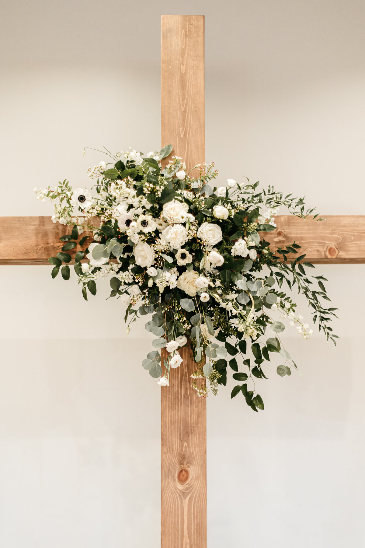 flowers on a cross for ceremony