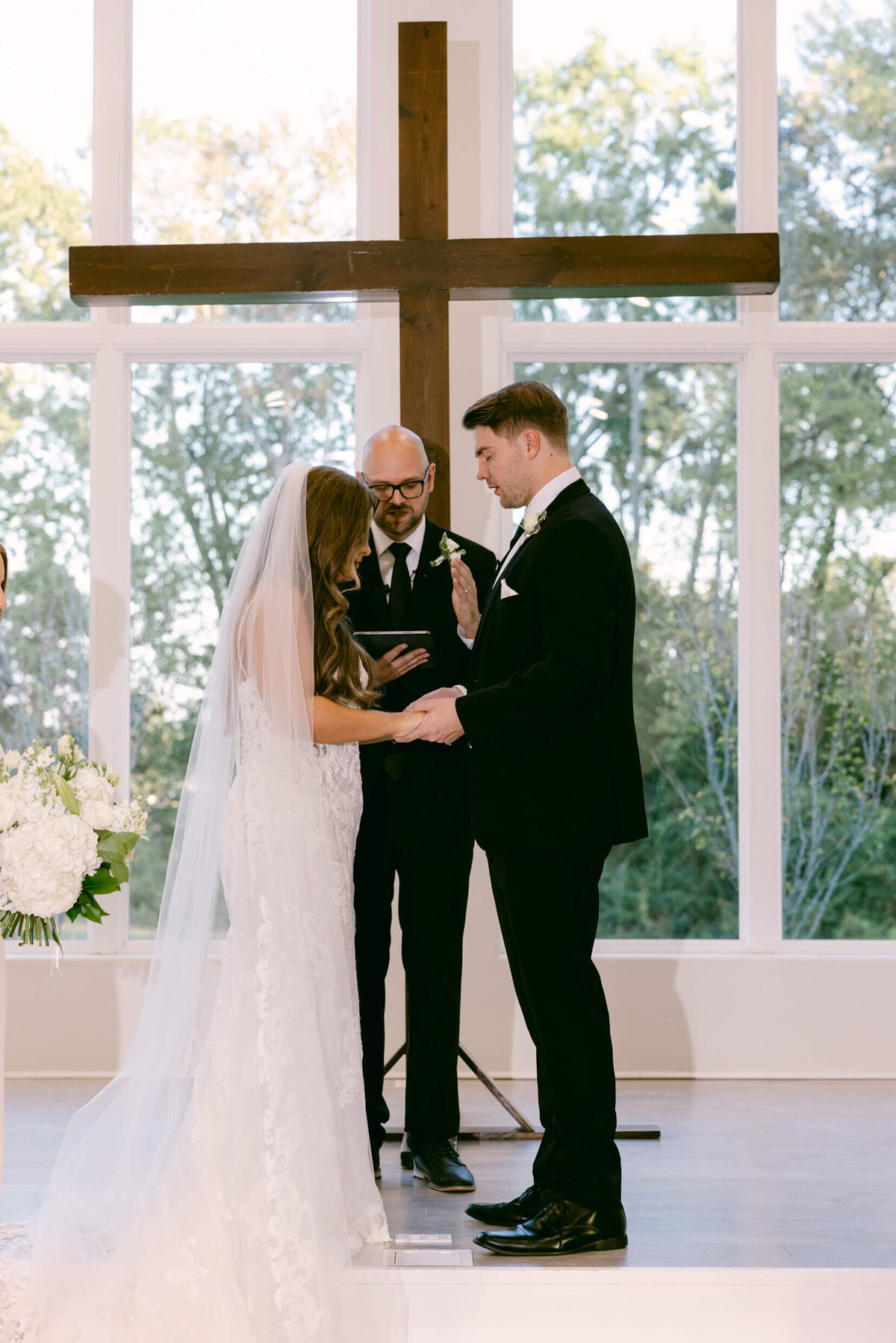 A wedding photo of the bride and groom during the ceremony